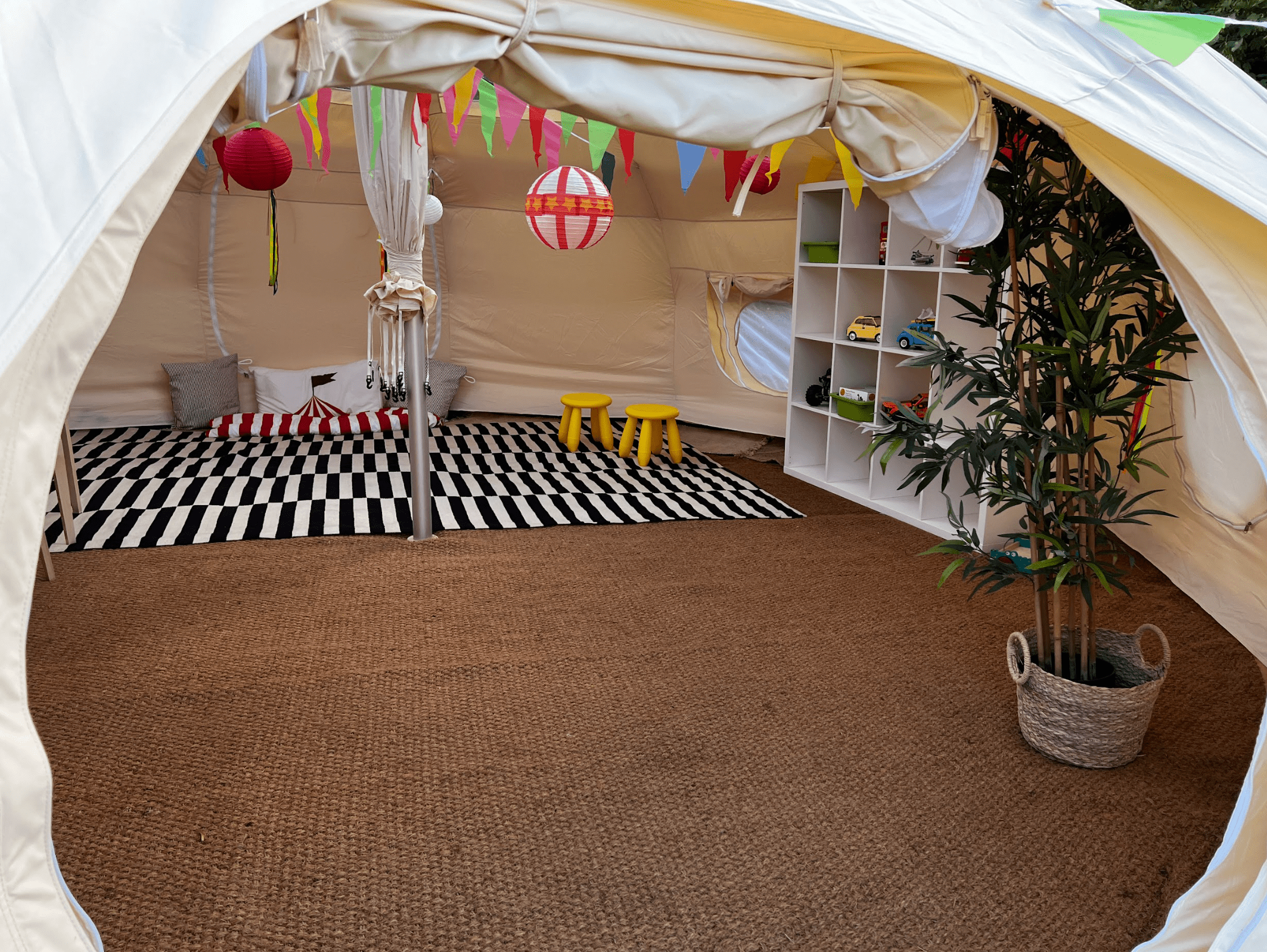 Tent Flooring - image of some Coir Matting installed in a luxury, canvas belle tent. A great way to add some extra luxury and insulation on your camping trips. Lotus Belle